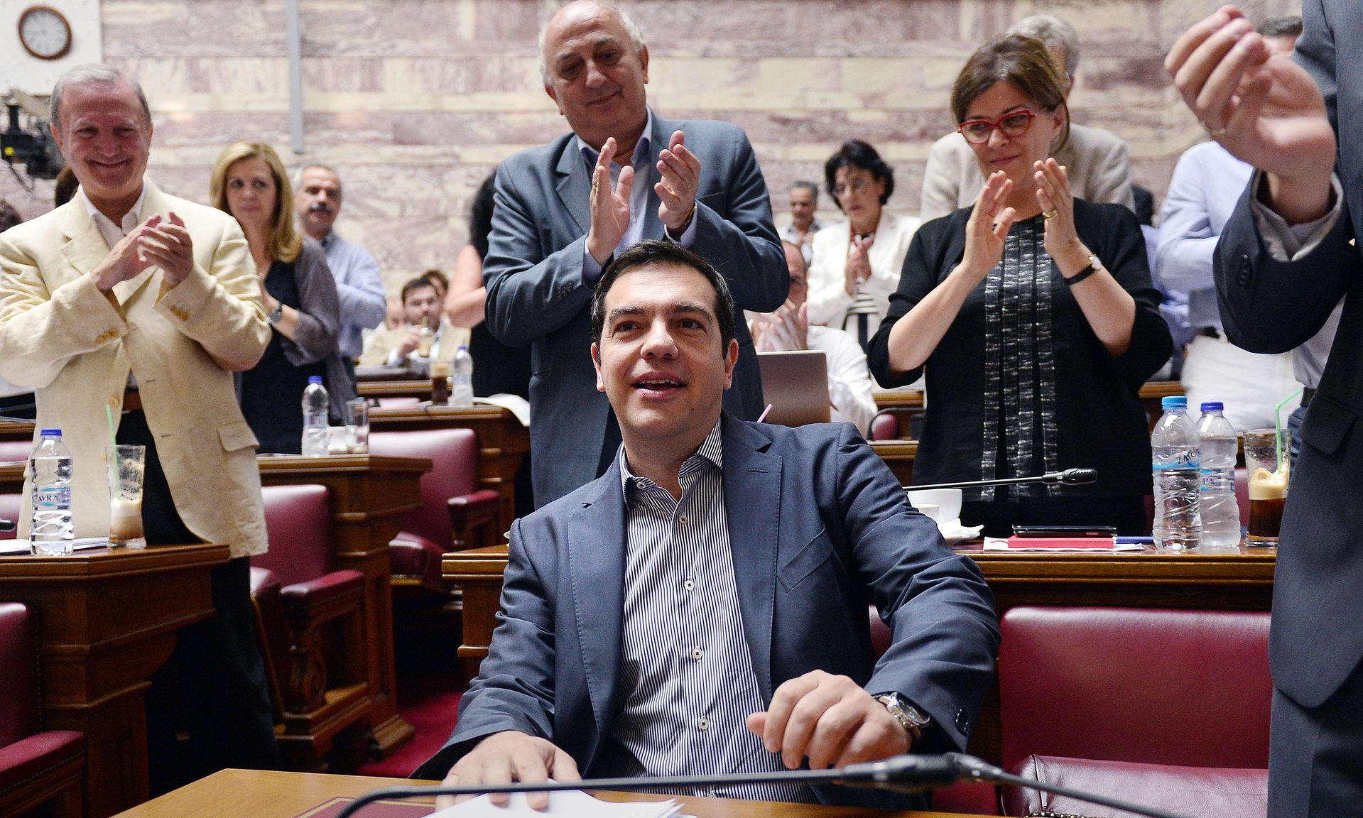Greek prime minister Alexis Tsipras is applauded by lawmakers before addressing his parliamentary group meeting in Athens on July 10, 2015. Photograph: Louisa Gouliamaki/AFP/Getty Images
