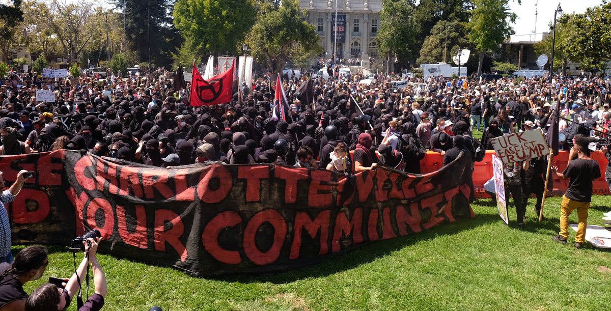 A banner reading “Avenge Charlottesville / Defend your community” at the counter-protest for “No To Marxism” rally in Berkeley, California, on August 27, 2017. 